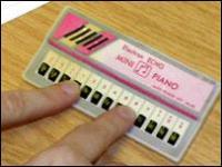 mini pocket piano toy